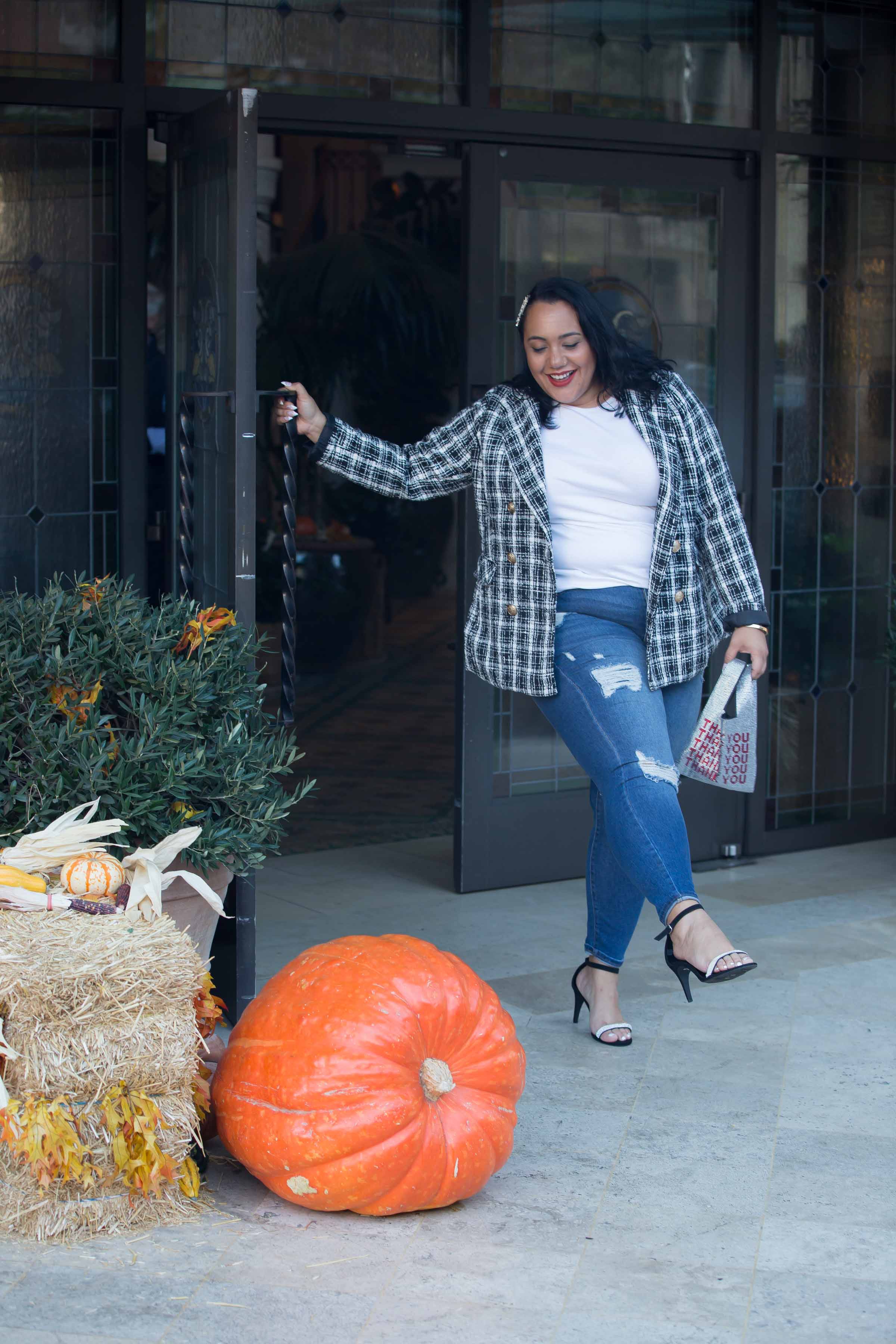 Amy Stretten, The Chief of Style, in a lane bryant blazer and plus size distressed jeans and a rhinestone thank you bag