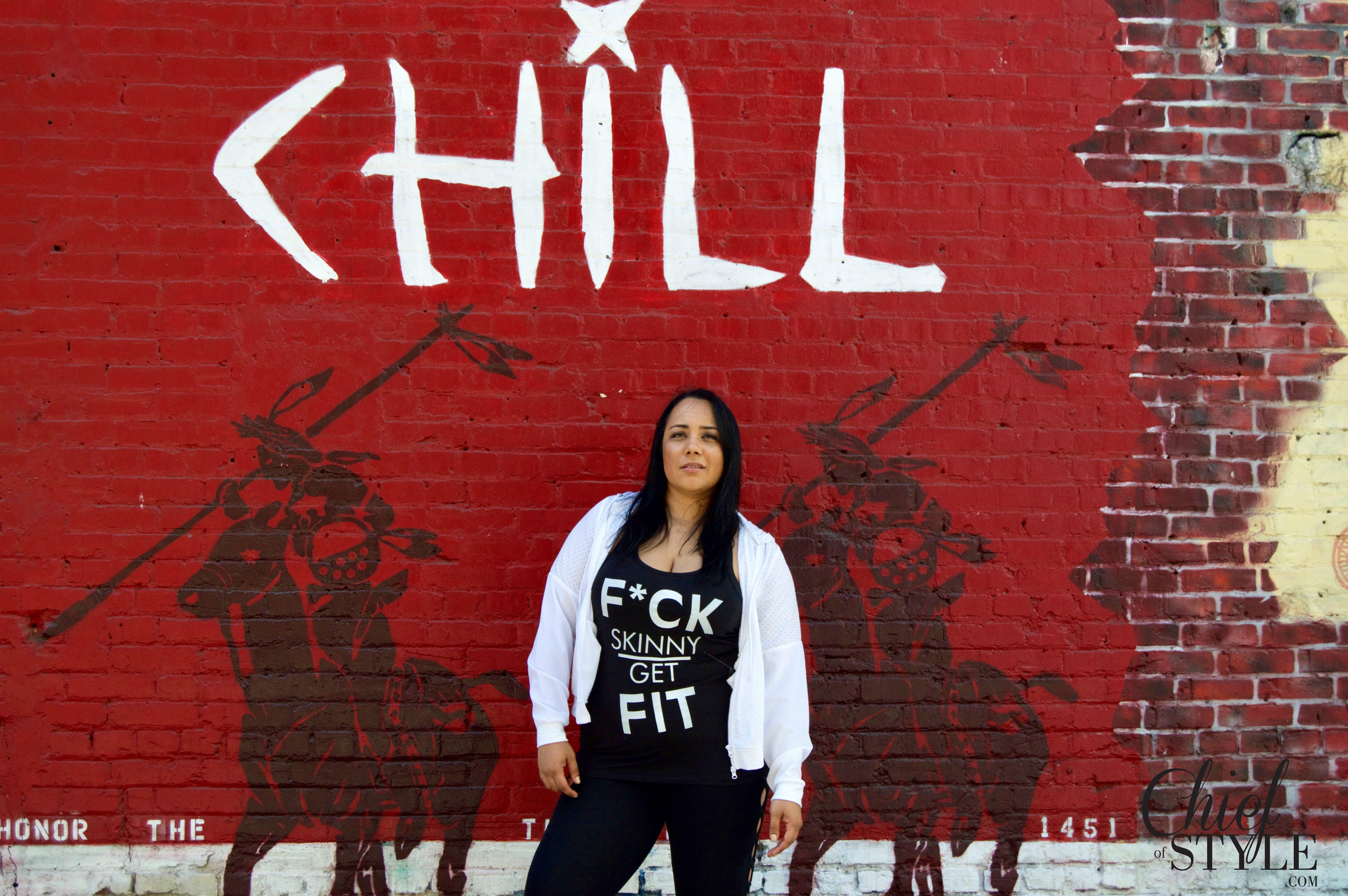Amy Stretten, Chief of Style, plus style blogger modeling Forever 21 Plus and Nike in front of the murals on Indian Alley in Downtown Los Angeles. 